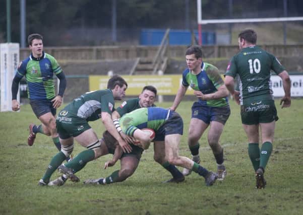 Hawick's Sean Muir is supported by teammate Ross Gibson (picture by Bill McBurnie)