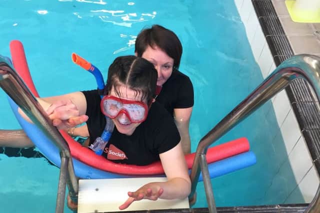 Natalie completes her sixth and final length at Selkirk Swimming Pool.