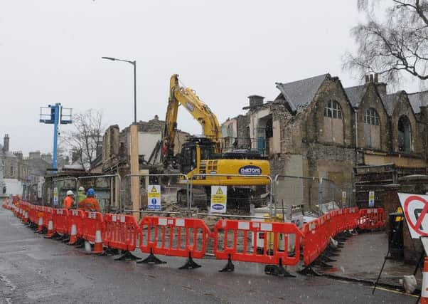 The old Co-op in Selkirk being demolished to make way for a dozen flats.