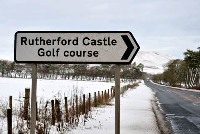 A sign pointing to the old Rutherford Castle golf course at West Linton.