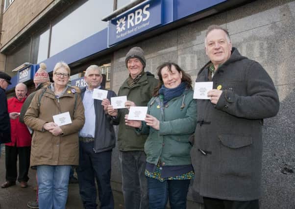 Councillors Clair Ramage and Andy Anderson with protestors at Selkirk's RBS objecting to the impending bank closure.