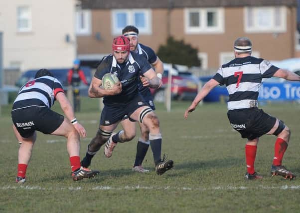 Number eight Ewen MacDougall, in his first full game back after injury, on the charge for Selkirk (picture by Grant Kinghorn).