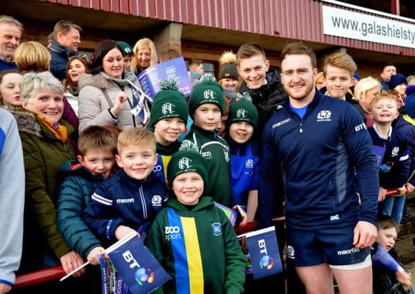 The crowd at Netherdale meets one of Scotland's top players, ex-Hawick fullback Stuart Hogg (picture by Alwyn Johnston).