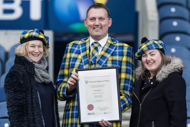 With Doddie at the launch of Doddie5 tartan are ScotlandShop founder Anna White and Emily Redman, its designer.