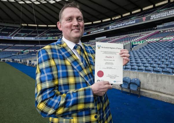Borders rugby legend Doddie Weir at Murrayfield clad in a new tartan he designed with the ScotlandShop to raise funds for his motor neurone disease research charity.