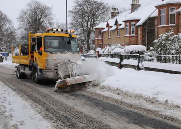 A snowplough in Scott's Place in Selkirk today.