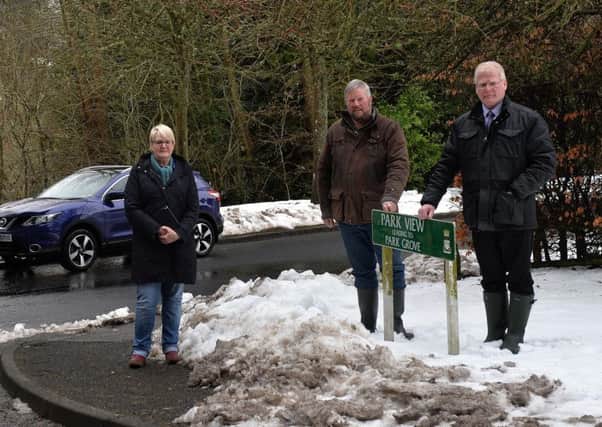 Councillors Clair Ramage, Neil Richards and Stuart Marshall at the corner of Wilton Park Road and Park View in Hawick.