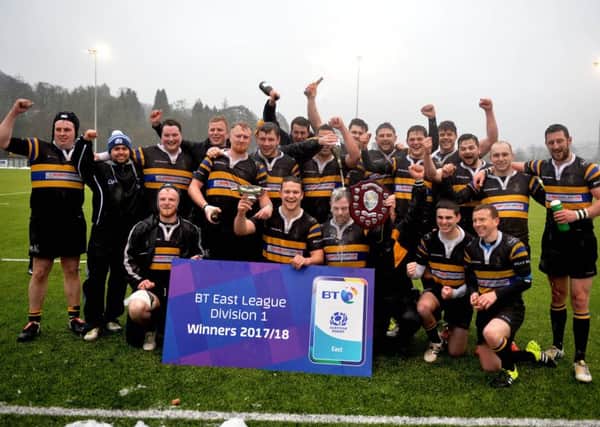 Hawick Harlequins savour the championship-winning moment (picture by Alwyn Johnston).