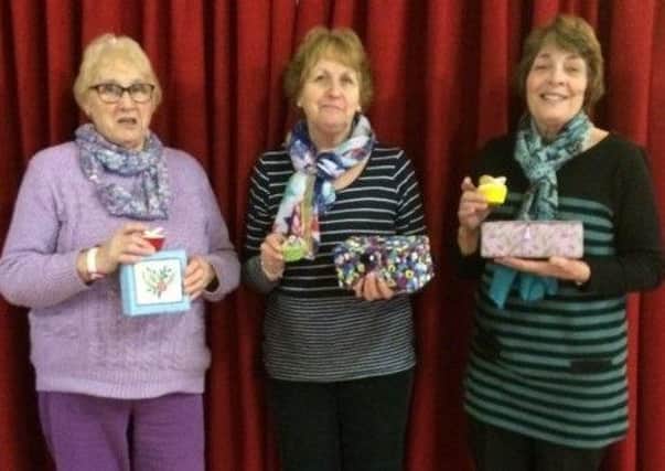 Helen Pearce, Anne Cochrane and Sheena Galloway dominated the competition honours at Midlem SWIs latest gathering.
The competition for a hand-made box of sweets resulted  1, Helen Pearce; 2, Anne Cochrane; 3, Sheena Galloway. In the challenge for three butterfly cakes, Anne came out on top, followed by Sheena and Helen Pearce respectively.