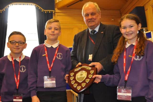 Scottish Borders Council Active School Award winners Knowepark Primary's Charlie Lyall, Lewis McCulloch and Ellen Douglas with Selkirkshire councillor Gordon Edgar.