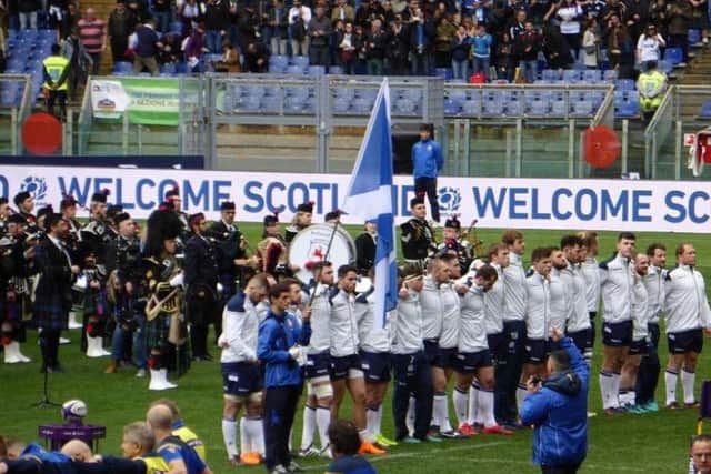 Jedburgh Pipe Band play on the pitch at the Stadio Olympico to play the national anthem.