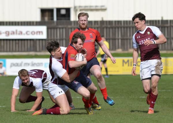 Hosts Gala in action against Langholm in last year's 7s event at Netherdale (picture by Alwyn Johnston).