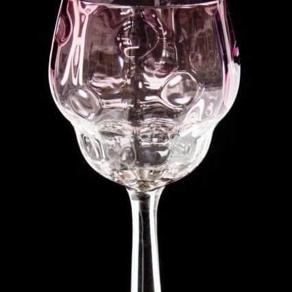 A glass designed in 1900 by Austrian artist Koloman Moser, bought for 99p at a charity shop, fetched Â£170 at auction.