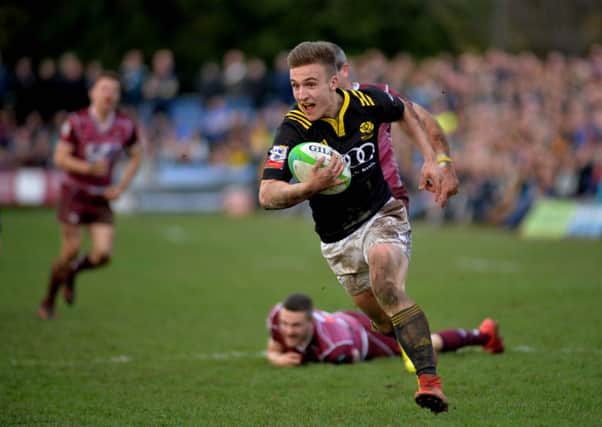 Ross McCann scores in the final for Melrose against Watsonians (picture by Alwyn Johnston)