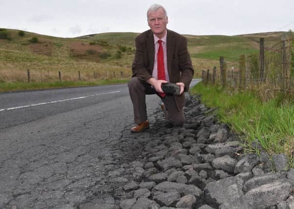 Hawick and Hermitage councillor Davie Paterson surveying the state of the B6399 to Newcastleton from Hawick.