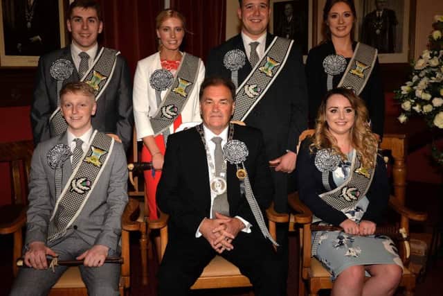 Bill White, front, is flanked by the new Braw Lad and Lass, Greg and Kimberley, while the other attendants, Greg Robertson, Amy Thomson, Mark Hood and Alex Mundell, look on.