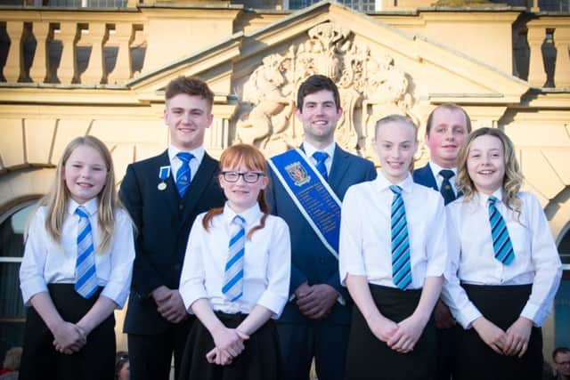 Sean and his attendants with this year's lady bussers.