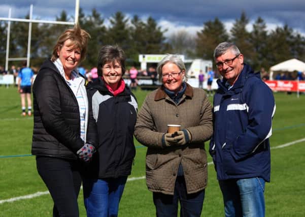 Lorna and Jim Hutchison Melrose supporters with their friends who support  Berwick.