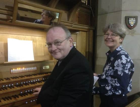 Chris Achenbach, Director of Music at Holy Trinity church, and Kate Blackledge, one of the church choristers, put in some practice for the music festival, which starts on Saturday, May 17.