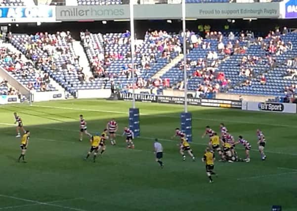 Action from the BT Cup Final between Melrose, in familiar yellow, and Stirling County.