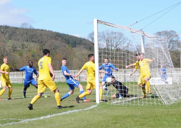 Ciaren Chalmers puts Selkirk one up against BSC Glasgow in the Lowland League Cup semi-final (picture by Grant Kinghorn).