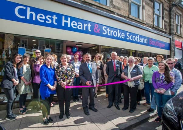 Chest Heart & Stroke Scotland (CHSS) has opened a new shop in Melrose, filled with designer labels and one-of-a-kind finds.
The boutique is located at the former Co-op site in High Street.
Simon Harris, local resident and CHSS trustee, cut a ribbon to officially open the premises. 
AimÃ©e Foster-Boyd, regional retail manager with CHSS, said: When we were re-fitting this shop, we found some fascinating things in the attic, including the original mirrors and doors that we have used in one of our rooms.

 Pictured, from left (by the ribbon), Aimee Foster-Boyd,shop manager Nicola Wood, Simon Harris, CHSS chairman Roger Smith and assistant shop manager Veronica Bell.