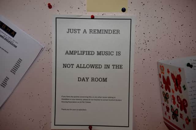 A notice reminding residents of the music ban.
