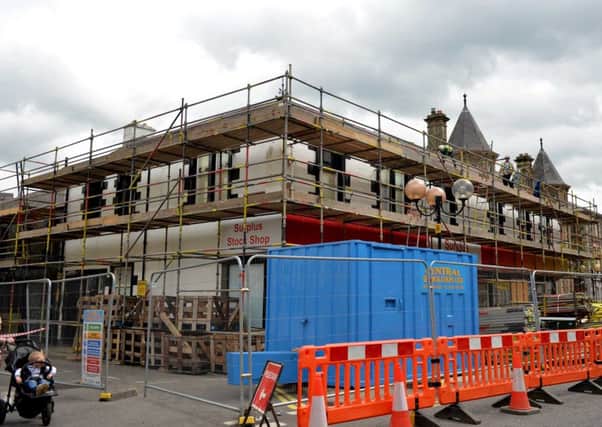 Demolition work is under way at the old Poundstretcher store in Galashiels.