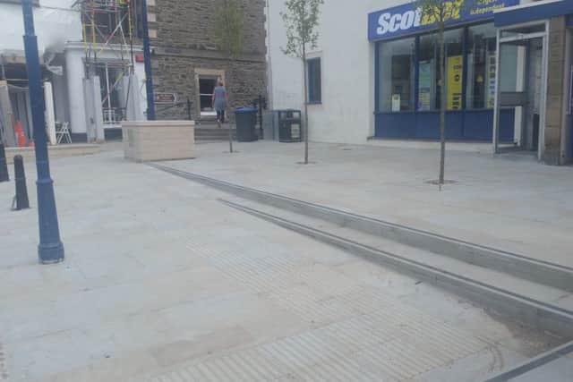The pavement outside Selkirk's Scotbet shop, which Cath Henderson says is being ruined by bikers.