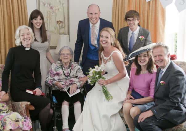 From left, Anna Rodwell, Lois Farnigham, Janet Smith, groom David Medcalf, bride Kirsty Medcalf, Jonathan Farningham and parents Marion and David Farningham.