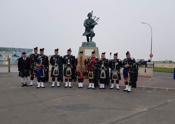 Jedburgh Pipe Band plays on the Normandy beaches for D-Day veterans.