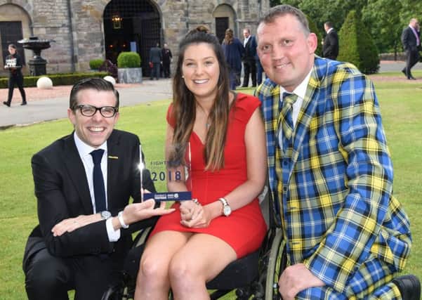 Lucy Lintott with Doddie Weir, right, and Lawrence Cowan, chairman of MND Scotland.