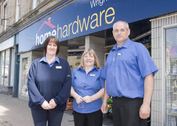 At Wright's Home Hardware in Hawick are manageress Sandra Wylie and sales assistants Sheila Kyle and Alan Irvine.
