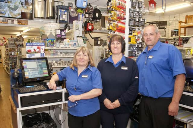 At Wright's Home Hardware in Hawick are manageress Sandra Wylie and sales assistants Sheila Kyle and Alan Irvine.