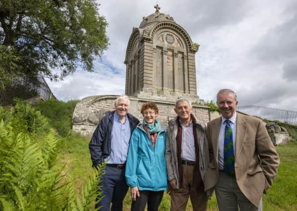 Nicky Toneri and David Freeman of the Friends of Monteath Mausoleum group, centre, with Gareth Baird, chairman of the Fallago environment fund, right, and Wrens Andrew Millar.