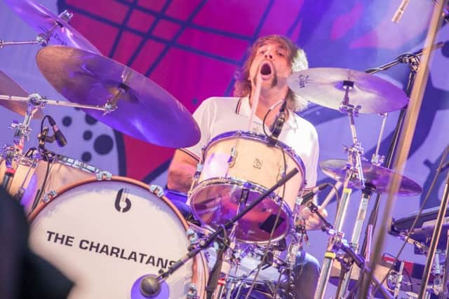 Frightened Rabbit drummer Grant Hutchison on stage with the Charlatans. Photo: Paul Campbell.