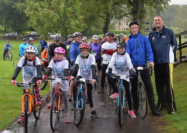 Doddie Weir with his son Hamish and neices who all rode the 11-mile route.