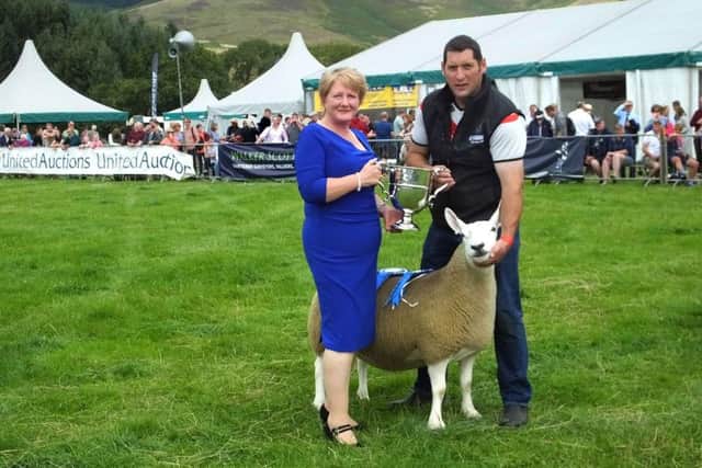 Presenting Lady is Mrs Kathleen Laird, Blyth Farm, Blyth Bridge, West Linton with Reserve Champion sheep.