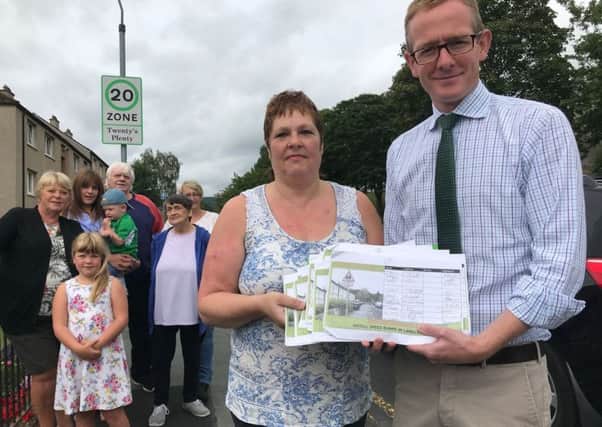 Langlee Drive residents present their petition to John Lamont MP.