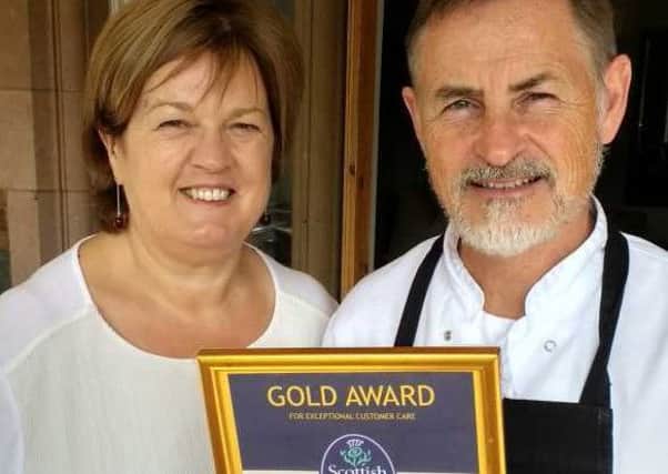 Windlestraws owners, John and Sylvia Matthews, with their award.