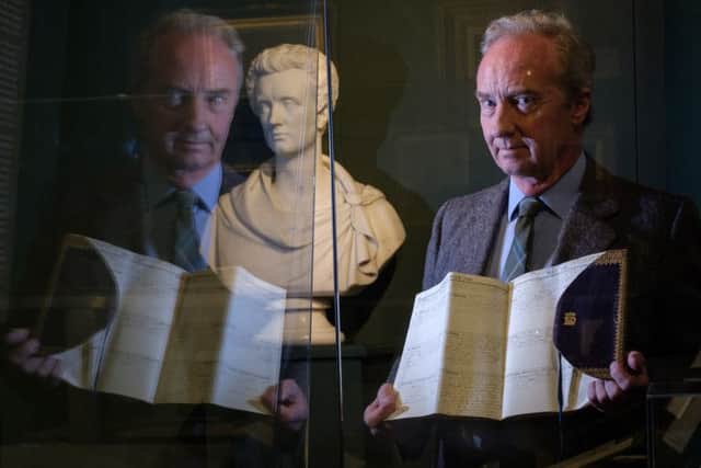 The Duke of Buccleuch admires the new Victoria exhibition which opens at Bowhill House this weekend.