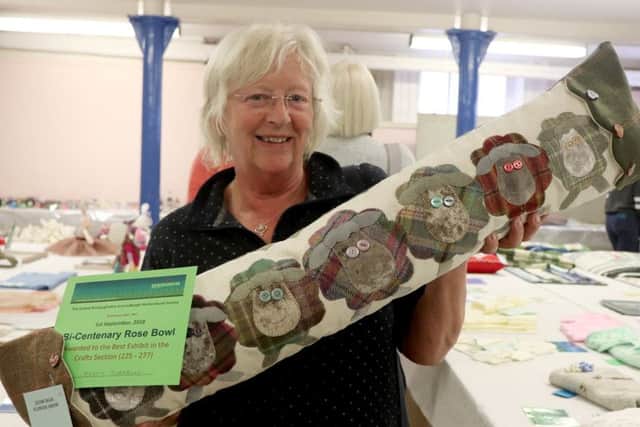 Betty Turnbull with her best exhibit in the craft section.