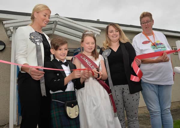 Langlee Lad and Lass Sean  Millar and Faye Kennedy cut the ribbon to open proceedings, watched by braw lasses Amy Thomson, Kimberley OMay and Kirsty McPherson