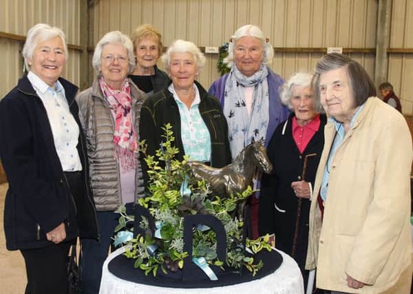Maureen Clarke, Dawn Platt, Margaret Plummer who made the Flower arrangement, Liz Sanderson with Founder members, Gilly Dalton, Janet Forbis- Walker and Moyna Turnbull