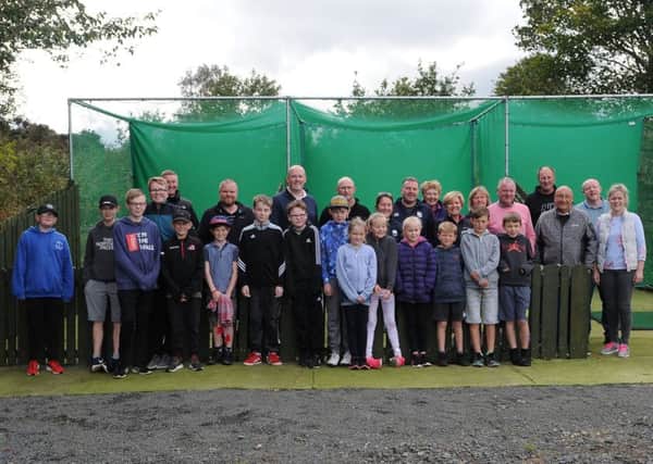 Some of the participants, parents and club members at Selkirk Golf Club's 'come and try' day (picture by Grant Kinghorn)