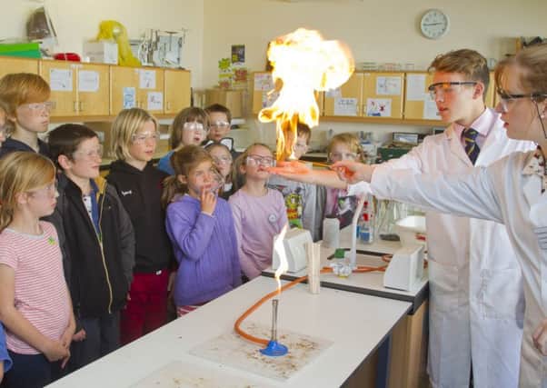 6th form scientists from Sedburgh Grammar School held a class at St Mary's, Joe Osborne and Elizabeth Morgan.