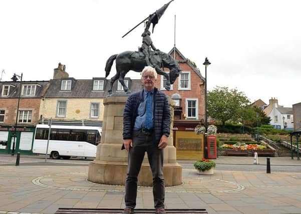Ian Landles at the horse statue in Hawick.