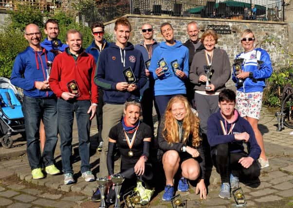 Michell Short, front, and the other principal winners from the 2018 Peebles Triathlon (picture by Alwyn Johnston).