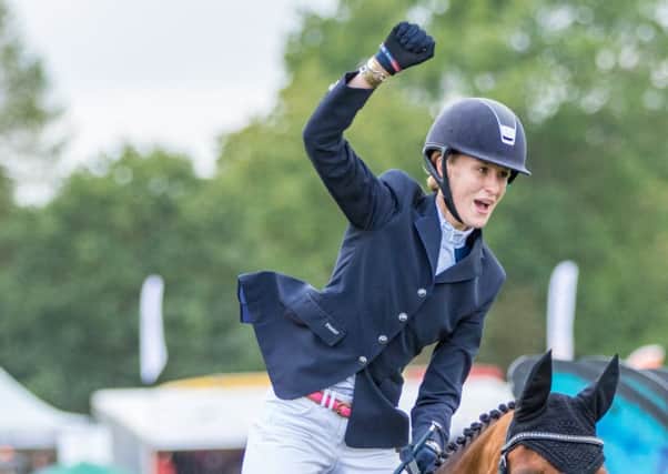 A winning salute from Bella Innes Ker (picture by Katie Neat Photography)