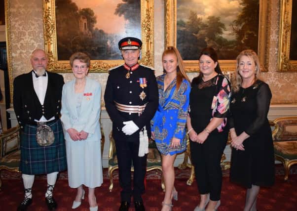 Eilean Hogarth, her son David, daughter-in-law Sharon and granddaughters Aimee and Hollie Hogarth with the Duke of Buccleuch